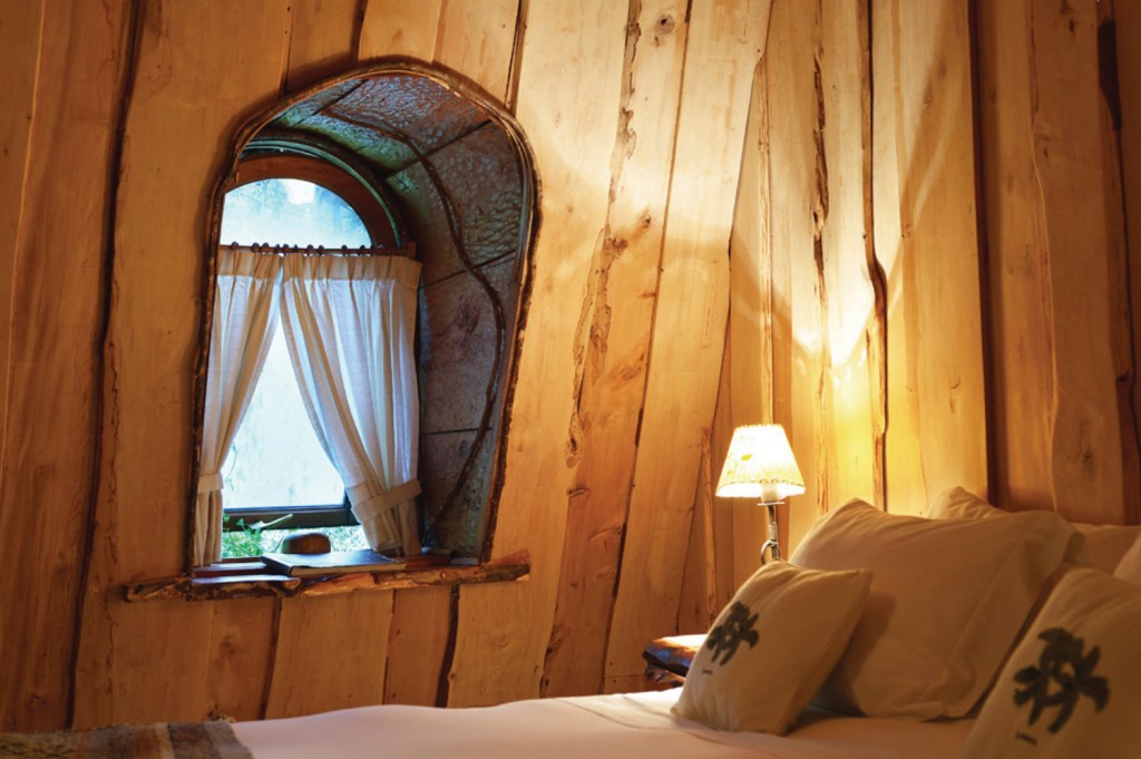 Montaña Mágica Lodge, en Patagonie chilienne, chambre cosy.